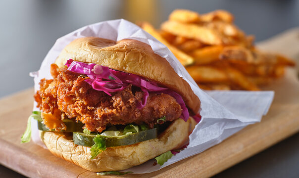 crispy fried chicken sandwich with pickles, coleslaw and mayo