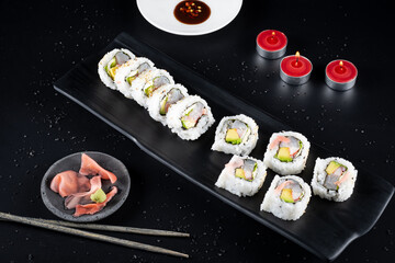 Raw fish sushi, shrimp, onion, avocado, lettuce and tiger's milk. spiced sushi sauce