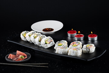 Raw fish sushi, shrimp, onion, avocado, lettuce and tiger's milk. table overview