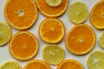 Background with sliced ​​oranges and lemons