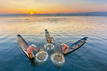 Fishermen in Inle Lake known also as leg rowers, Myanmar © MehmetOZB