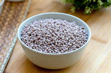 Bowl of raw couscous made by siyez flour