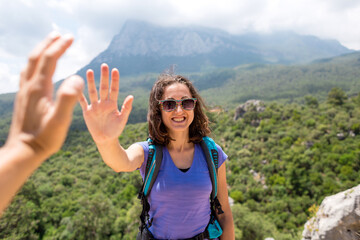 Girl greets friend, The girl gives five, Gesture of greeting