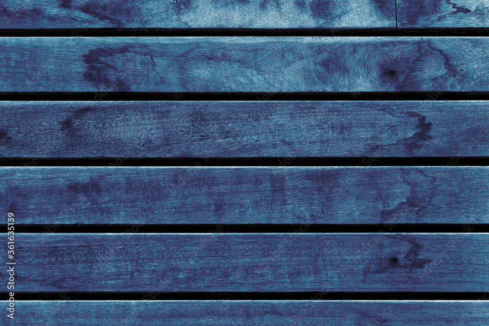 Wall mural blue wooden column, old background.