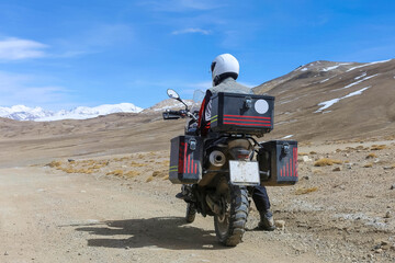 man on a motorcycle in the desert