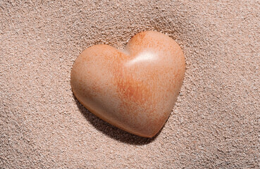 Stone heart in the sand. 
