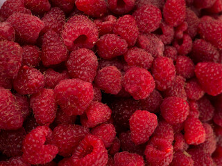 Fresh raspberries background closeup photo
