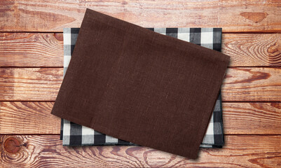 Napkin. Stack of colorful dish towels on brown desk