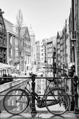 Naklejka na ściany i meble Canal, Houses and Bike in Amsterdam Black & White