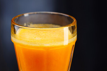 glass of orange juice. shallow depth of field