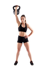 Fototapeta premium Woman working out with kettlebell