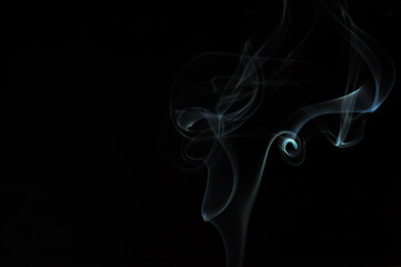 White smoke on a black background