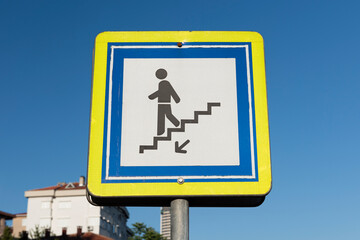 European traffic underpass walk sign.