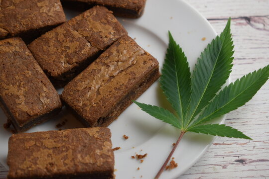 Brownies And Cannabis Leaf.