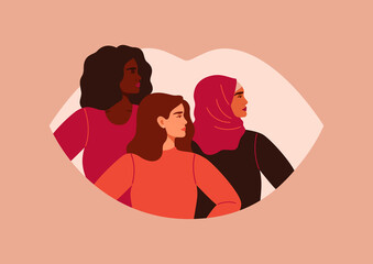 Three women of different nationalities and cultures standing together. Feminists on the background of the female lips. The concept of gender equality and of the female empowerment movement.