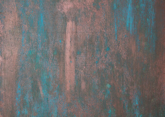 The texture of the copper background is covered with a patina	