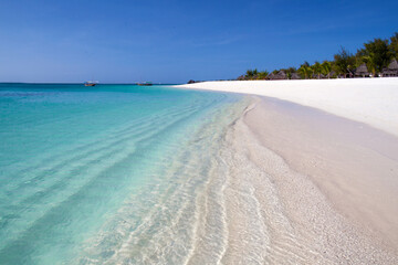 Turquoise water and white sand beach at Kendwa, Zanzibar. Empty beach during pandemic. 