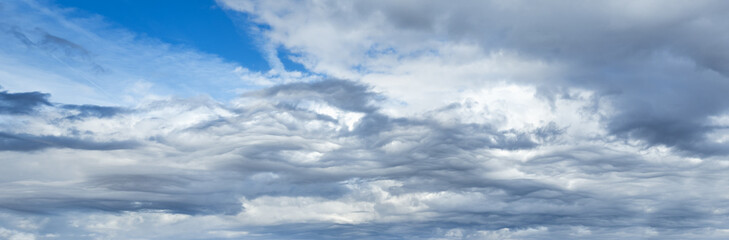 Clouds in the overcast sky view. Climate, environment and weather concept sky background.