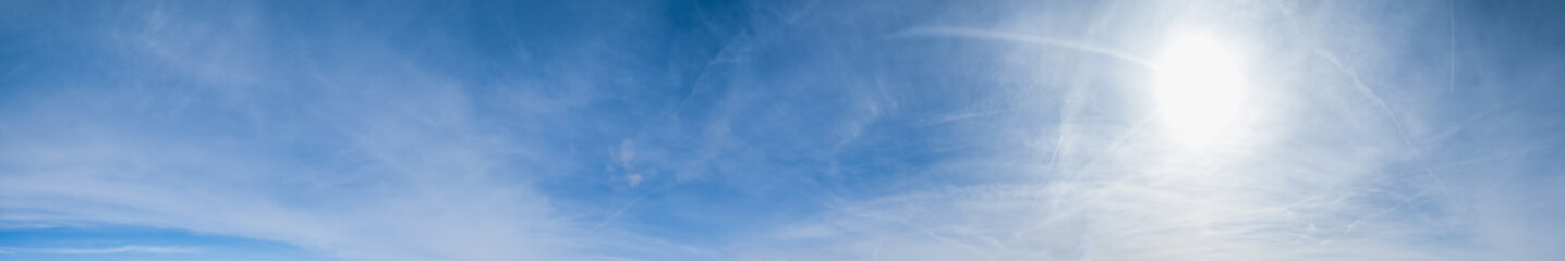 White fluffy cirrus and cirrocumulus clouds  in blue azure sky. Summer sky and good weather concept high resolution background.