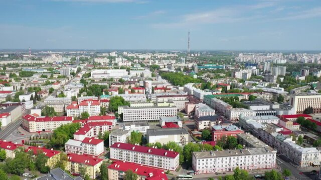 Top Aerial View Of Cityscape. The historic center of Gomel. The red roofs of the city of Gomel. View of the central area of Gomel. Flight over the quarter between Sovetskaya Street and Lenin.
