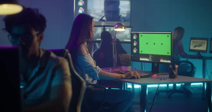 Video editors at work in editing room