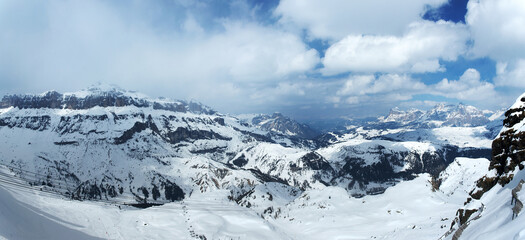 Winter mountains. Snowy slopes at skiing resort