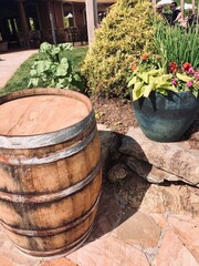 old wooden barrel with flowers