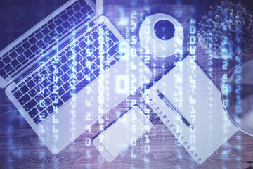 Multi exposure of data theme drawing hologram over topview work desk background with computer. Concept of technology.