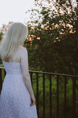 Young beautiful blonde woman in the park.