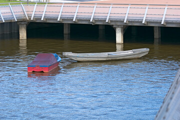 Old destroyed boat left on the river