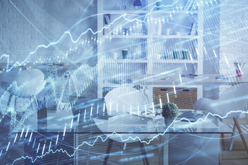 Double exposure of financial graph drawing and office interior background. Concept of stock market.