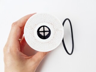 Car oil filter on a white background. Space for text. Isolate.