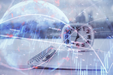 Multi exposure of financial graph drawings and desk with open notebook background. Concept of forex