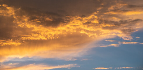 Naklejka na ściany i meble sunset clouds in the sky