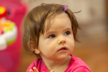 baby girl watching cartoon