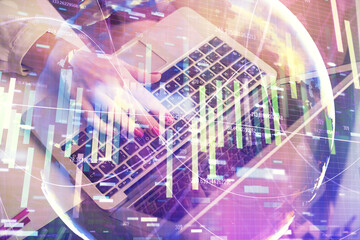 Multi exposure of woman hands typing on computer and business theme hologram drawing. Success concept.