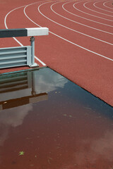 track field with water