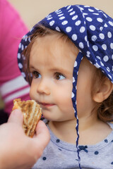 baby eating strudel