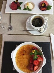 ice cream and cream br&ucirc;l&eacute; desserts with berries and mint