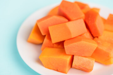 Sliced ripe papaya fruit on plate, Tropical fruit	

