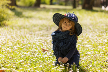 little girl in a flower field