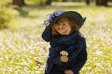 little girl in a flower field