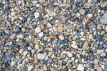 small multi-colored pebbles texture background. colorful stones