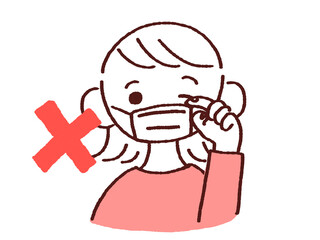 目を触る　マスク姿の若い女性