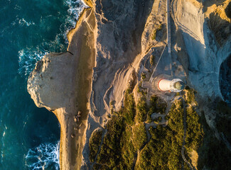 Sunrise on Castle Point from drone with lighthouse, New Zealand