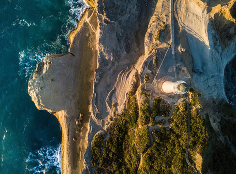 Sunrise on Castle Point from drone with lighthouse, New Zealand
