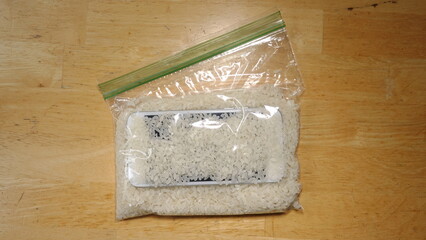 Smartphone drying out in a bag of rice 