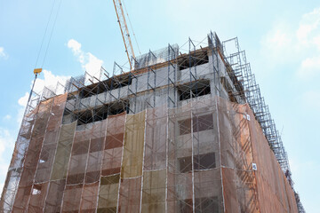 A new high rise residential building taking shape as work on the construction progresses.