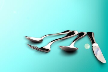 Fork, knife, spoon, teaspoon, cutlery on the desk