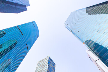 Fototapeta na wymiar Modern skyscraper in Shanghai, with blue sky in the back.